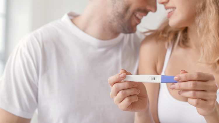 Pregnancy test happy indian couples